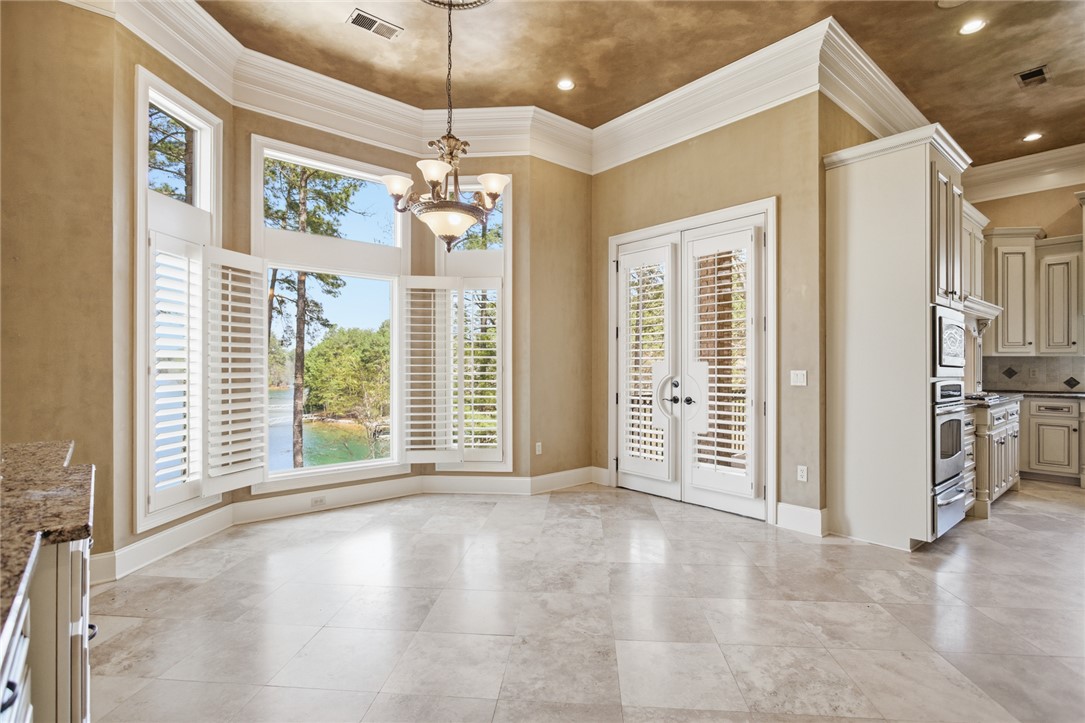 610 Highridge Drive Seneca, SC 29672 - Photo 21 of 50 This bright space offers stunning water views and you can drink your morning coffee on the balcony.