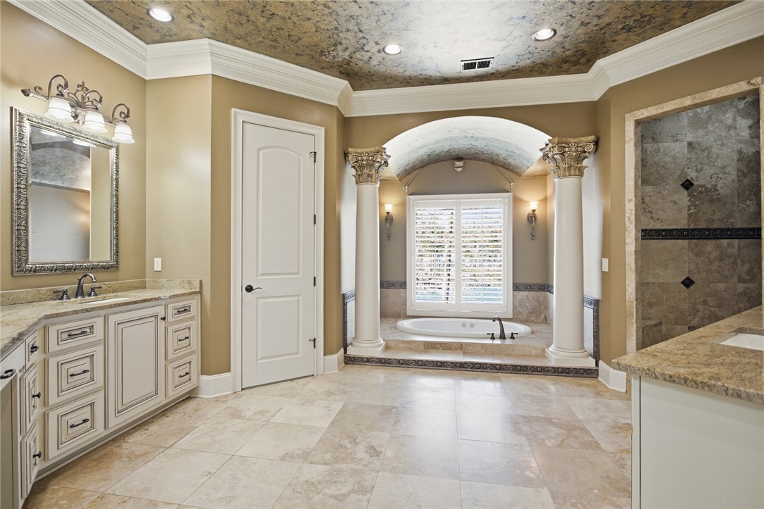 610 Highridge Drive Seneca, SC 29672 - Photo 28 of 50 Luxurious bathroom with ample space, elegant finishes, and a relaxing soaking tub.