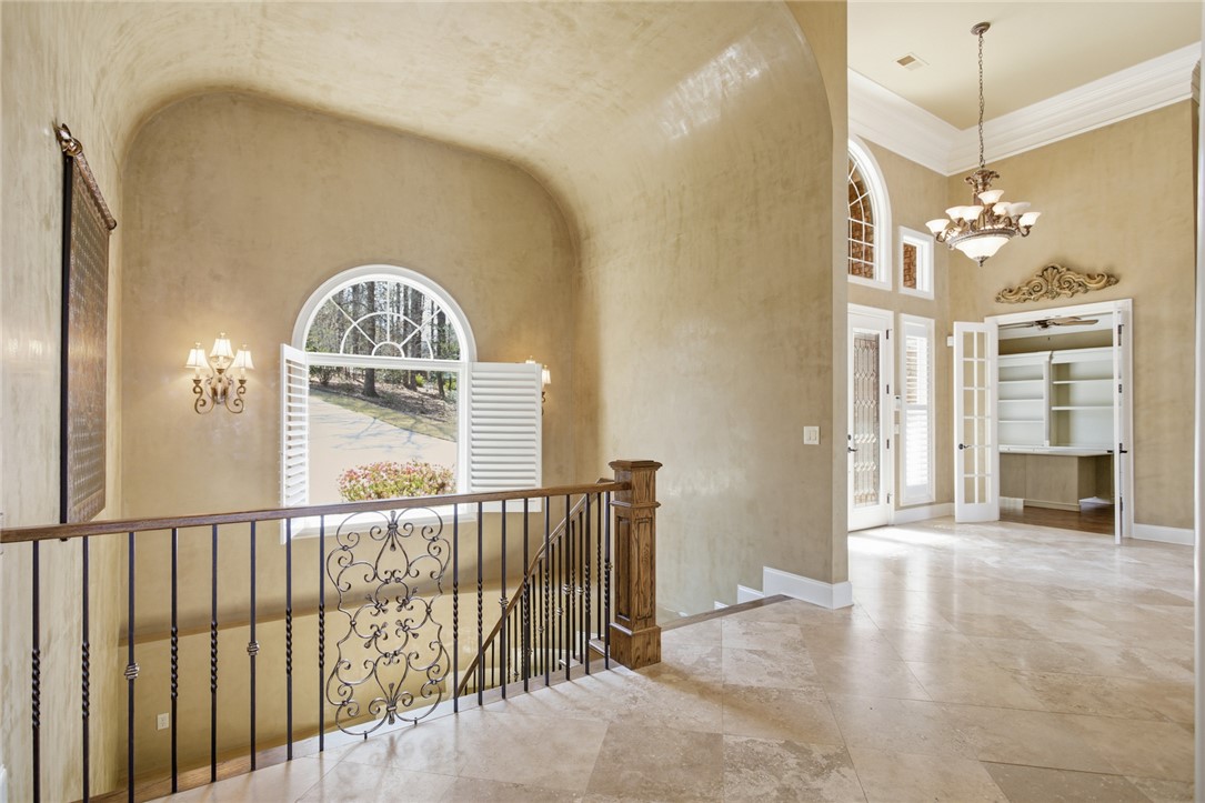 610 Highridge Drive Seneca, SC 29672 - Photo 31 of 50 This spacious interior landing offers abundant natural light and elegant architectural details.