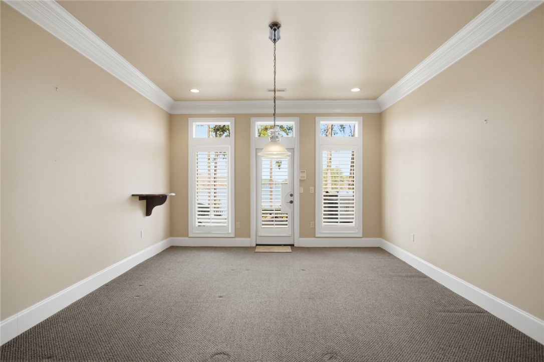 610 Highridge Drive Seneca, SC 29672 - Photo 33 of 50 This versatile room features an abundance of natural light and access to outdoor living. It's perfect for a pool table.