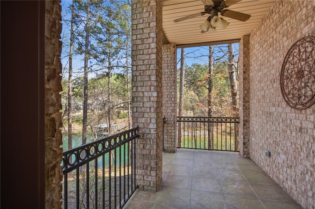 610 Highridge Drive Seneca, SC 29672 - Photo 39 of 50 This inviting porch offers tranquil views of the surrounding Lake Keowee and lush greenery.