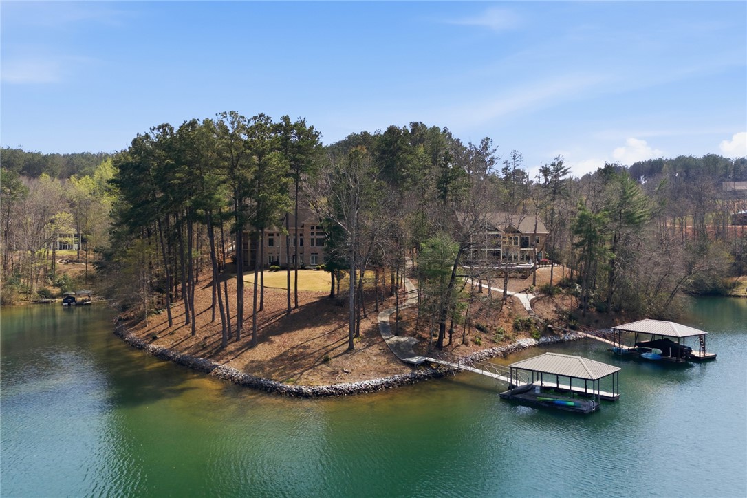 610 Highridge Drive Seneca, SC 29672 - Photo 4 of 50 This tranquil Lake Keowee property boasts private dock, offering direct access to serene waters and expansive views.