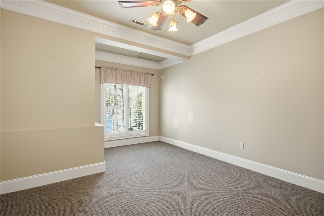 610 Highridge Drive Seneca, SC 29672 - Photo 47 of 50 An inviting room features architectural ceiling details and a window offering natural light.