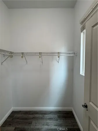 a view of a room with racks on the wall