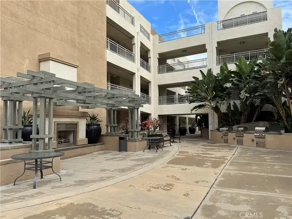 a view of a building with sitting area