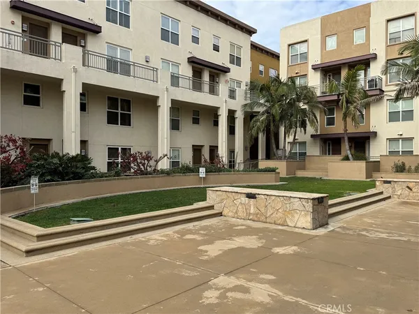 a view of a building with a swimming pool