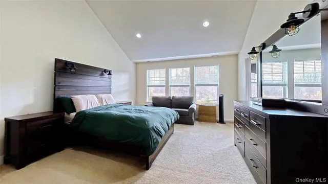 a kitchen with granite countertop lots of counter space and window