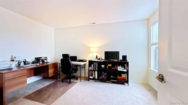 a bedroom with a bed and a closet