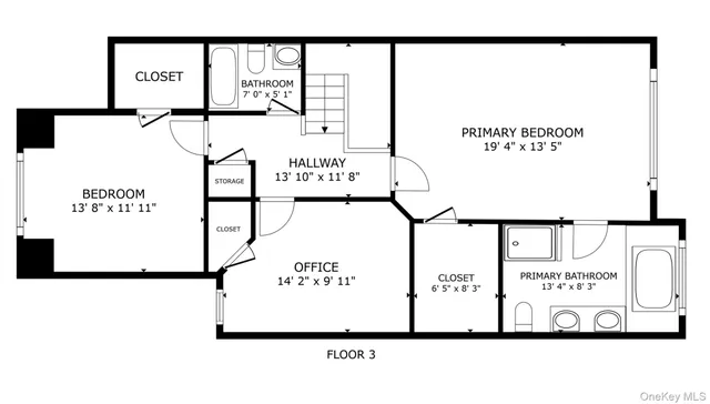 a black and white photo of a living room