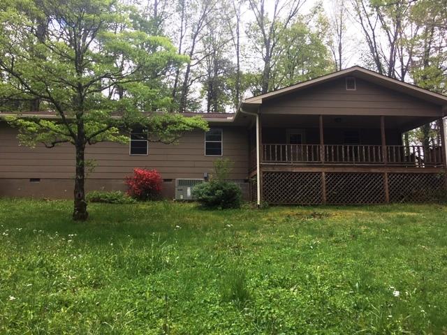 24 Hamby Road Blue Ridge, GA 30513 - Photo 1 of 14 a front view of a house with a yard