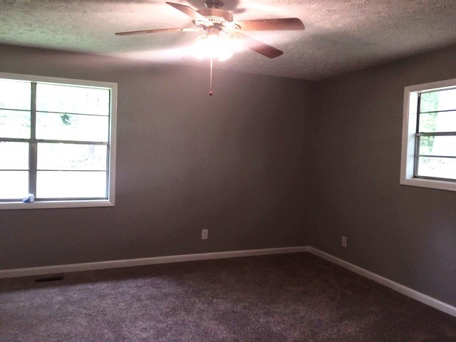 24 Hamby Road Blue Ridge, GA 30513 - Photo 12 of 14 an empty room with a window