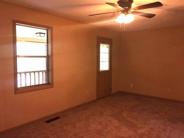 24 Hamby Road Blue Ridge, GA 30513 - Photo 8 of 14 an empty room with a window