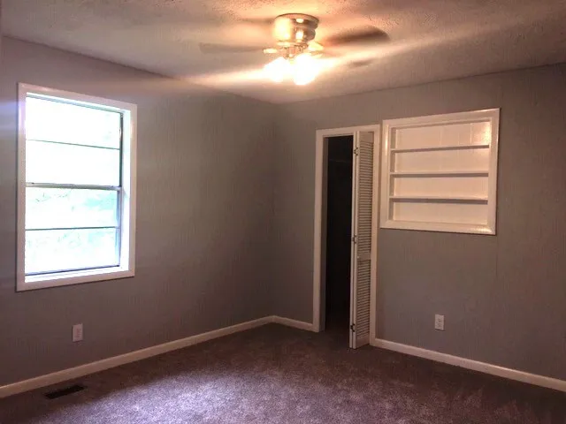 an empty room with a window