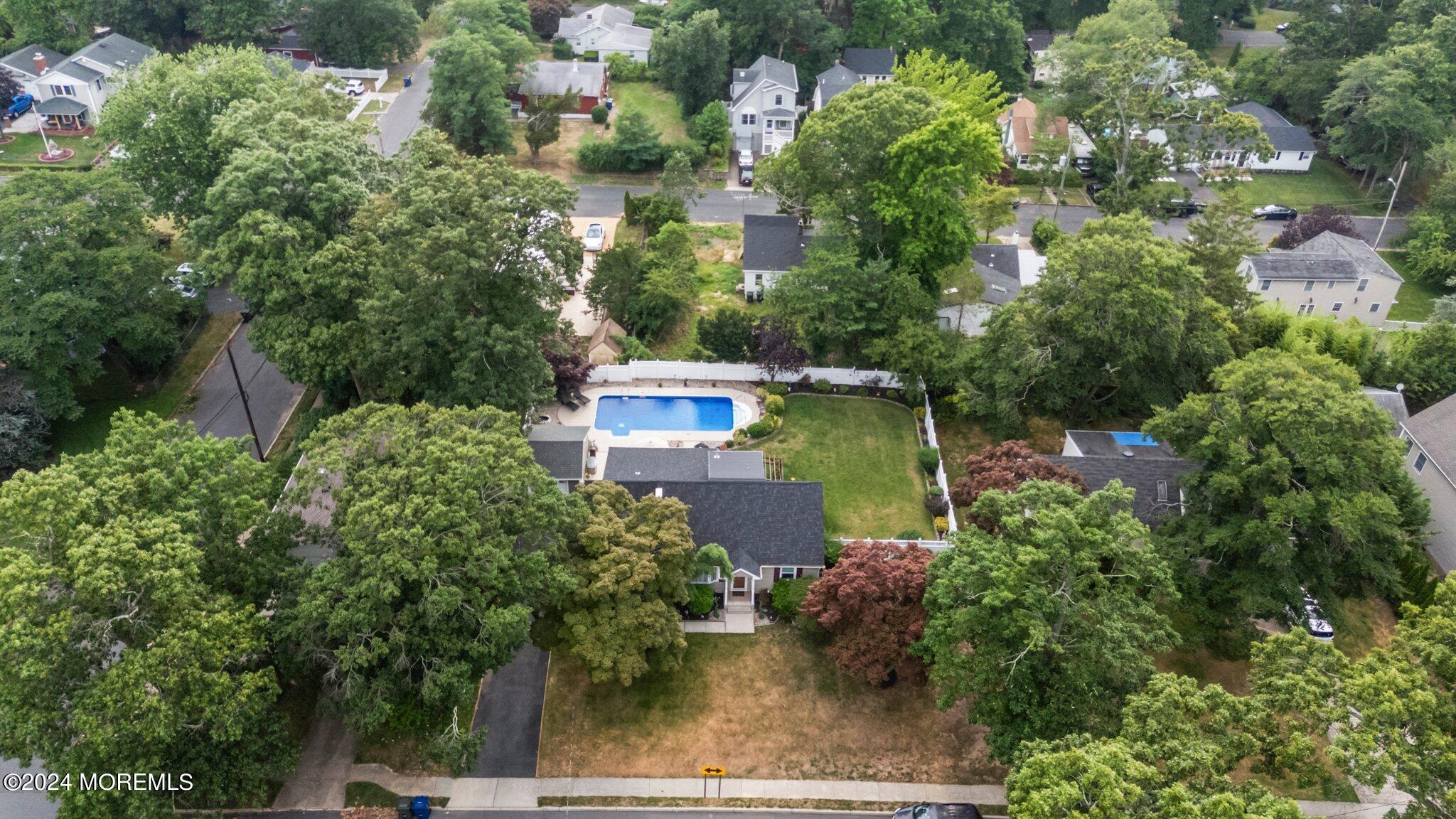 202 Highwood Road Oakhurst, NJ 07755 - Photo 44 of 48 an aerial view of a house with a yard basket ball court and outdoor seating