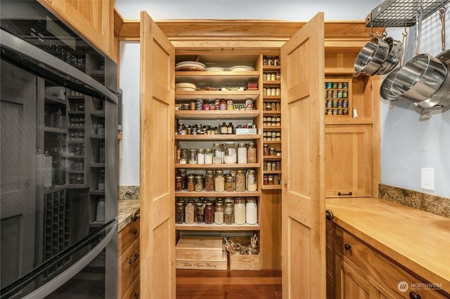 a kitchen with a sink and a stove