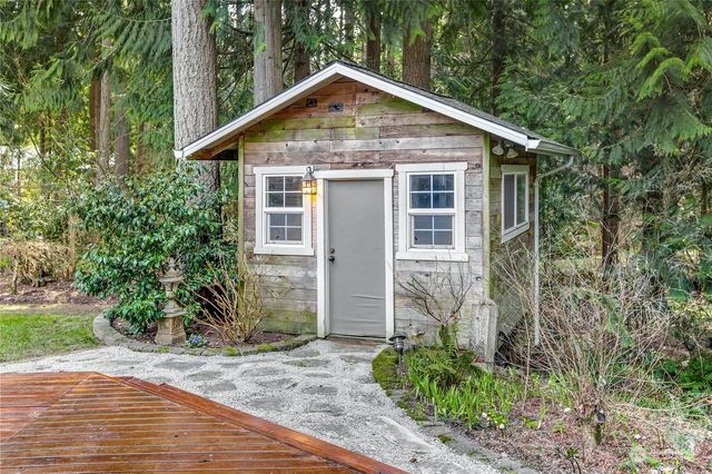 a view of a garden from a balcony