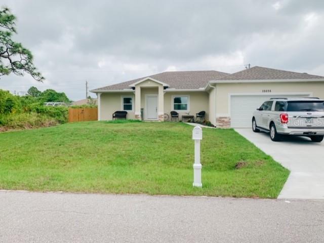12032 Edwards Road Port Charlotte, FL 33981 - Photo 1 of 1 Pretty stone accents on front