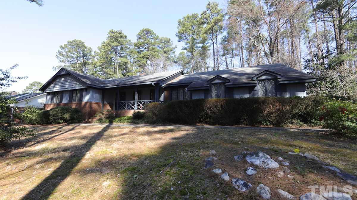 210 Queensferry Road Cary, NC 27511 - Photo 14 of 14 a front view of a house with a garden