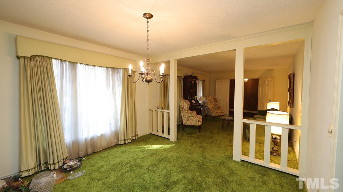 210 Queensferry Road Cary, NC 27511 - Photo 3 of 14 a view of a livingroom with swimming pool and furniture