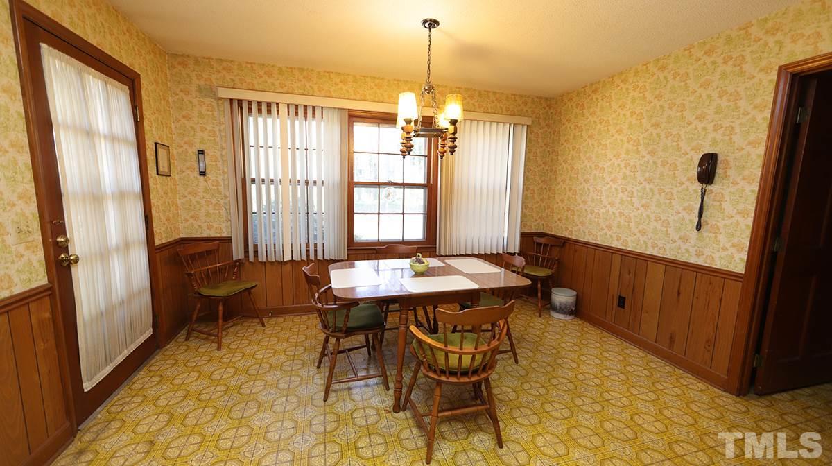 210 Queensferry Road Cary, NC 27511 - Photo 4 of 14 a dining room with furniture and window