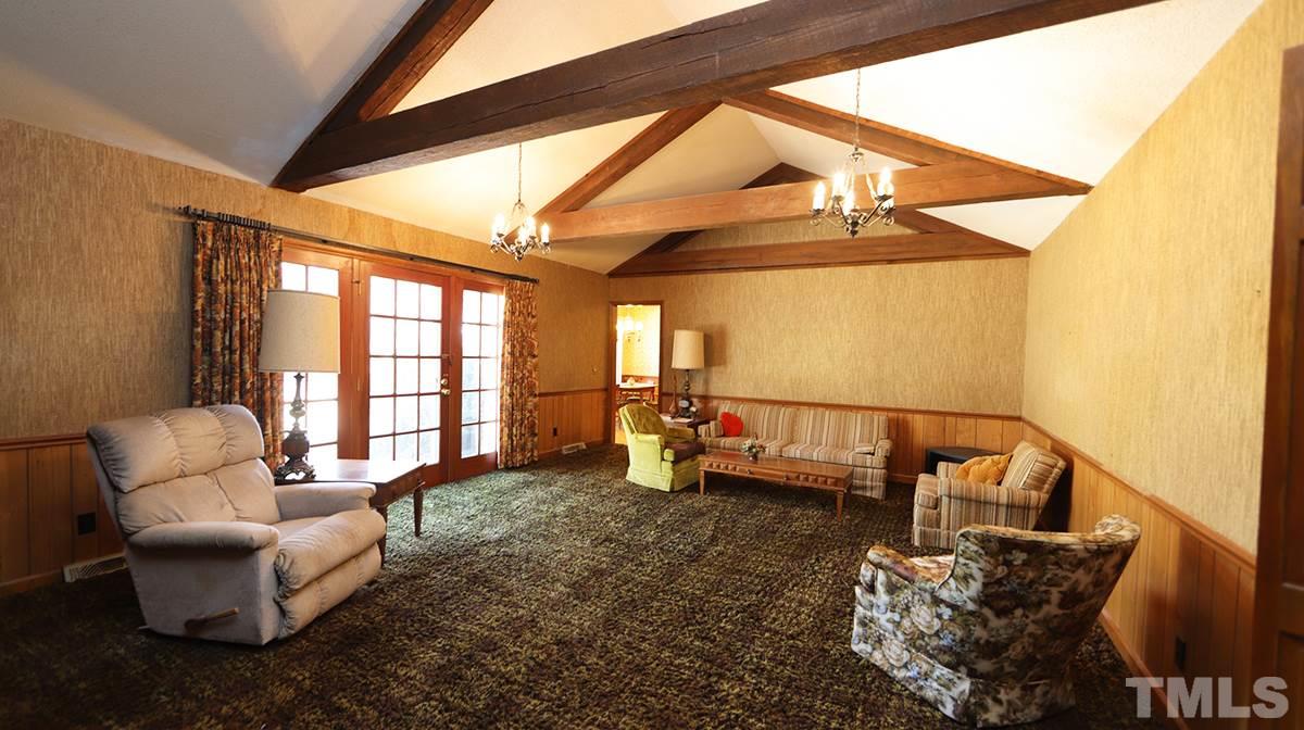 210 Queensferry Road Cary, NC 27511 - Photo 7 of 14 a living room with furniture and a window