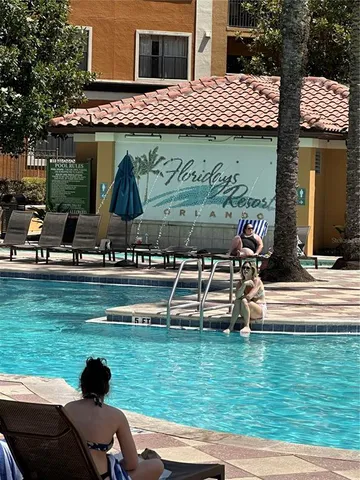 a view of a chairs and table in a patio
