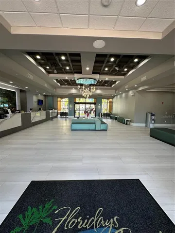 a view of a hall with living room