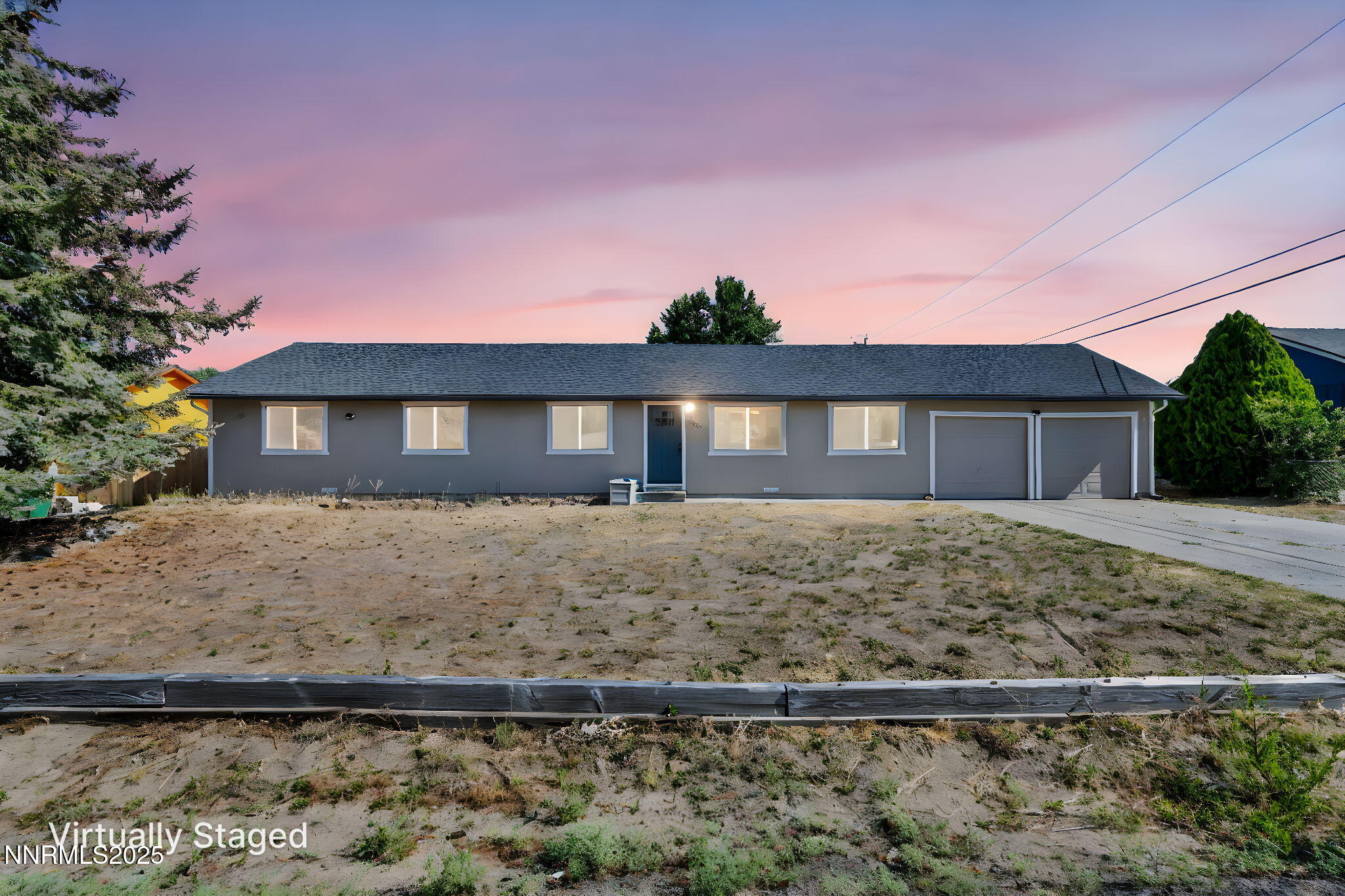 17265 Cold Springs Drive Reno, NV 89508 - Photo 1 of 52 a front view of a house with a garden