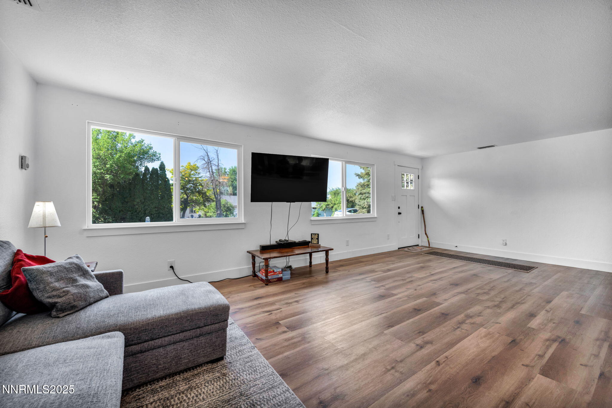 17265 Cold Springs Drive Reno, NV 89508 - Photo 12 of 52 a living room with furniture and a flat screen tv