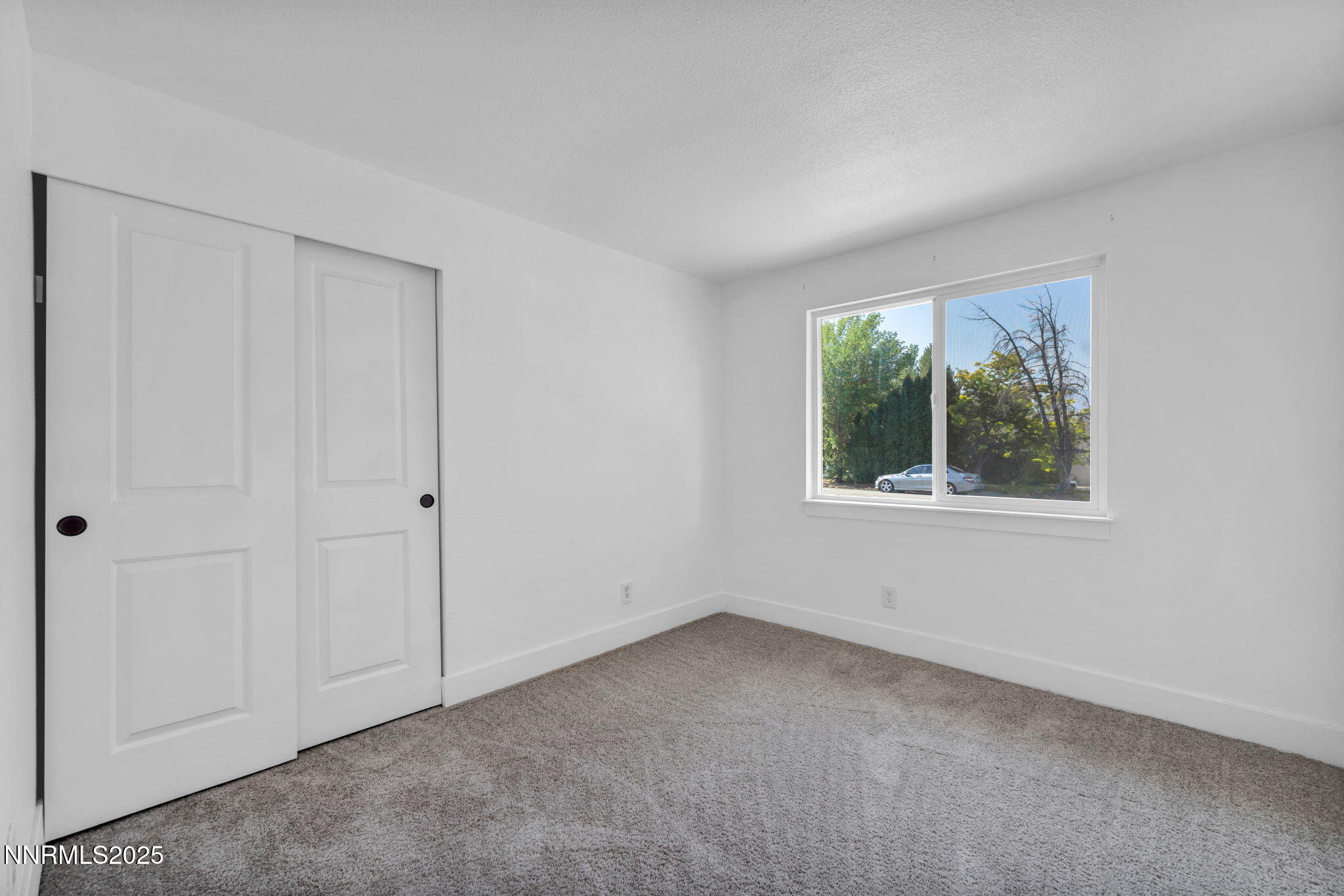 17265 Cold Springs Drive Reno, NV 89508 - Photo 23 of 52 a view of an empty room with a window