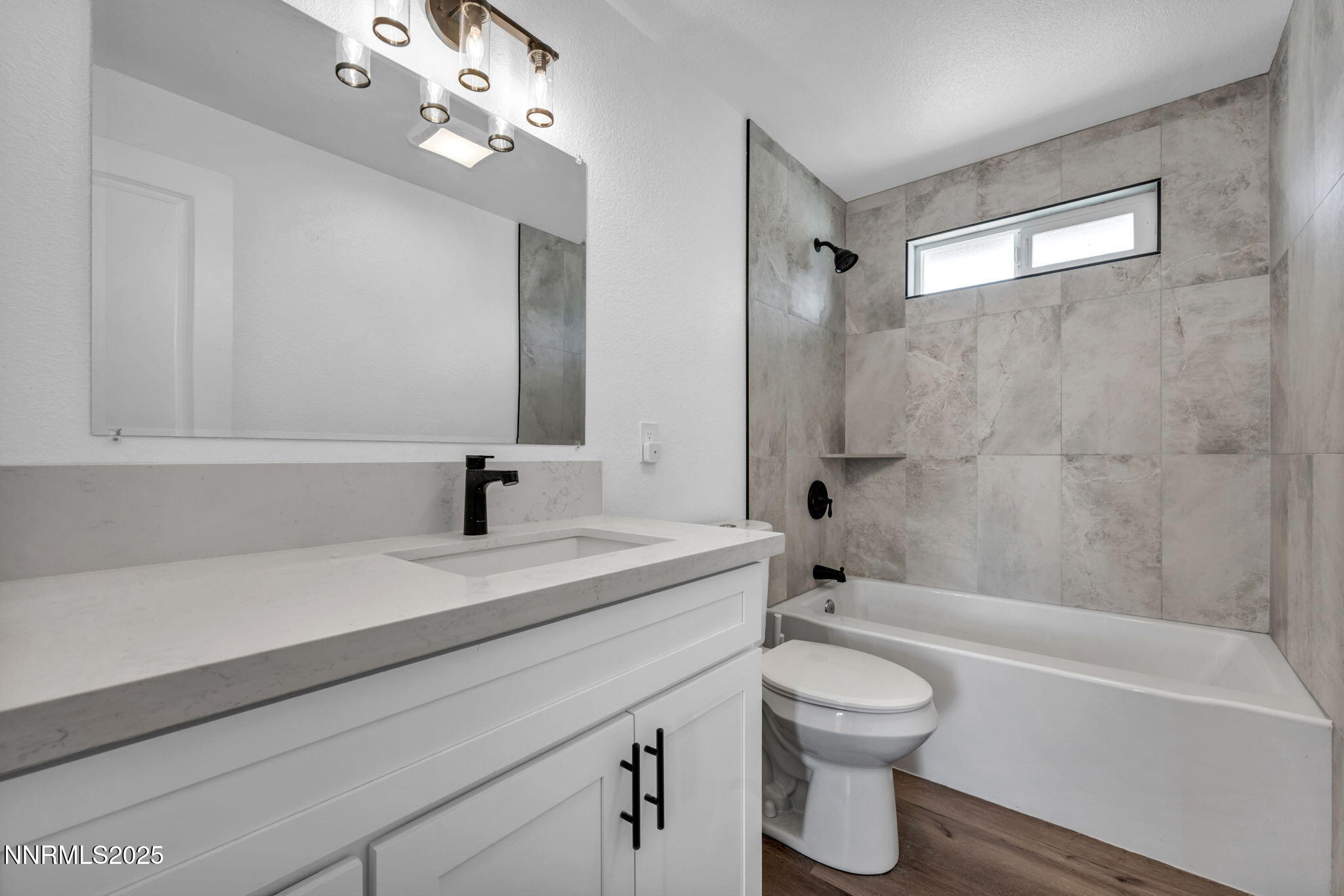 17265 Cold Springs Drive Reno, NV 89508 - Photo 27 of 52 a bathroom with a sink a toilet and a bathtub