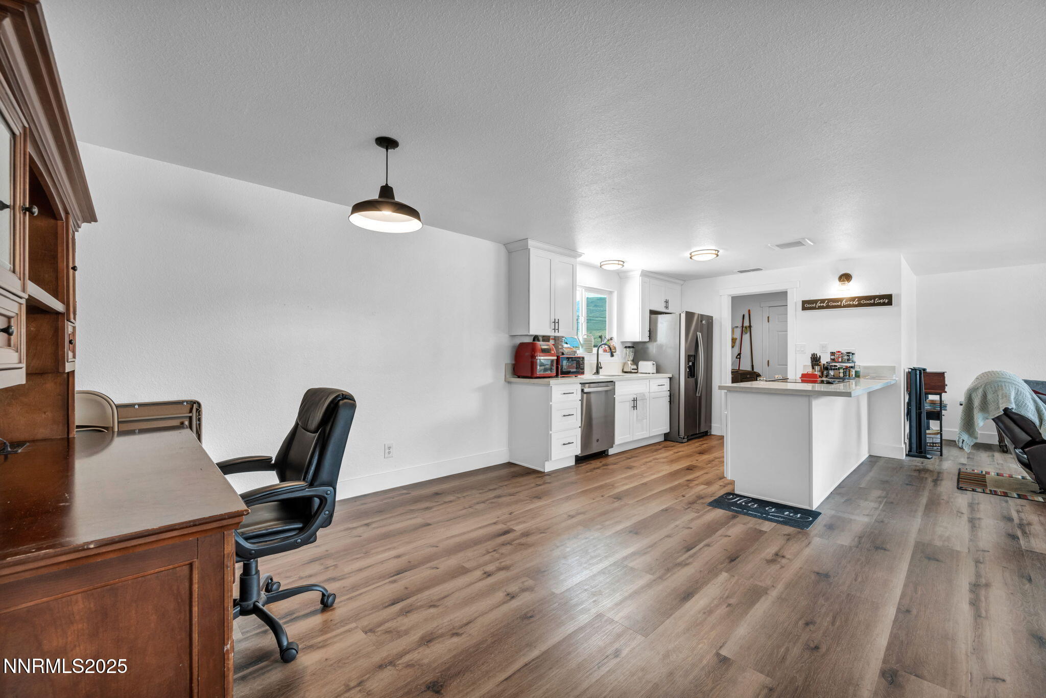 17265 Cold Springs Drive Reno, NV 89508 - Photo 36 of 52 a living room with furniture and kitchen view