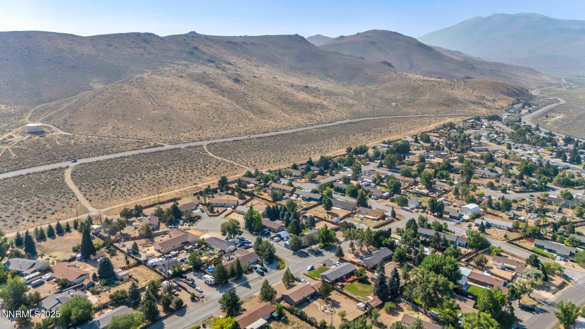17265 Cold Springs Drive Reno, NV 89508 - Photo 51 of 52 an aerial view of house with yard and mountain view in back