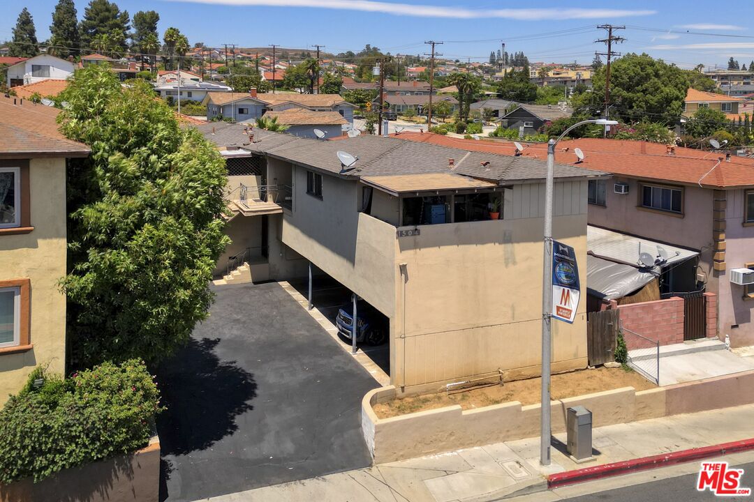 1504 West Beverly Boulevard Montebello, CA 90640 - Photo 9 of 24 an aerial view of a house with a yard