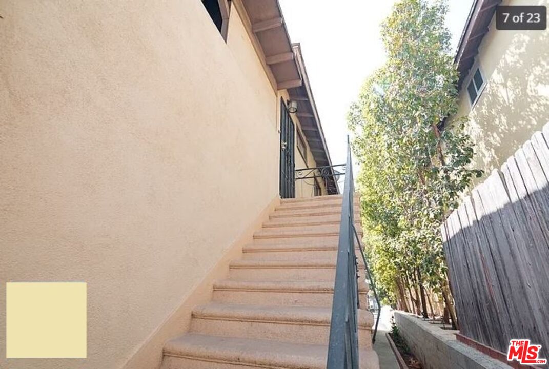 1504 West Beverly Boulevard Montebello, CA 90640 - Photo 10 of 24 a view of entryway with wooden floor and stairs
