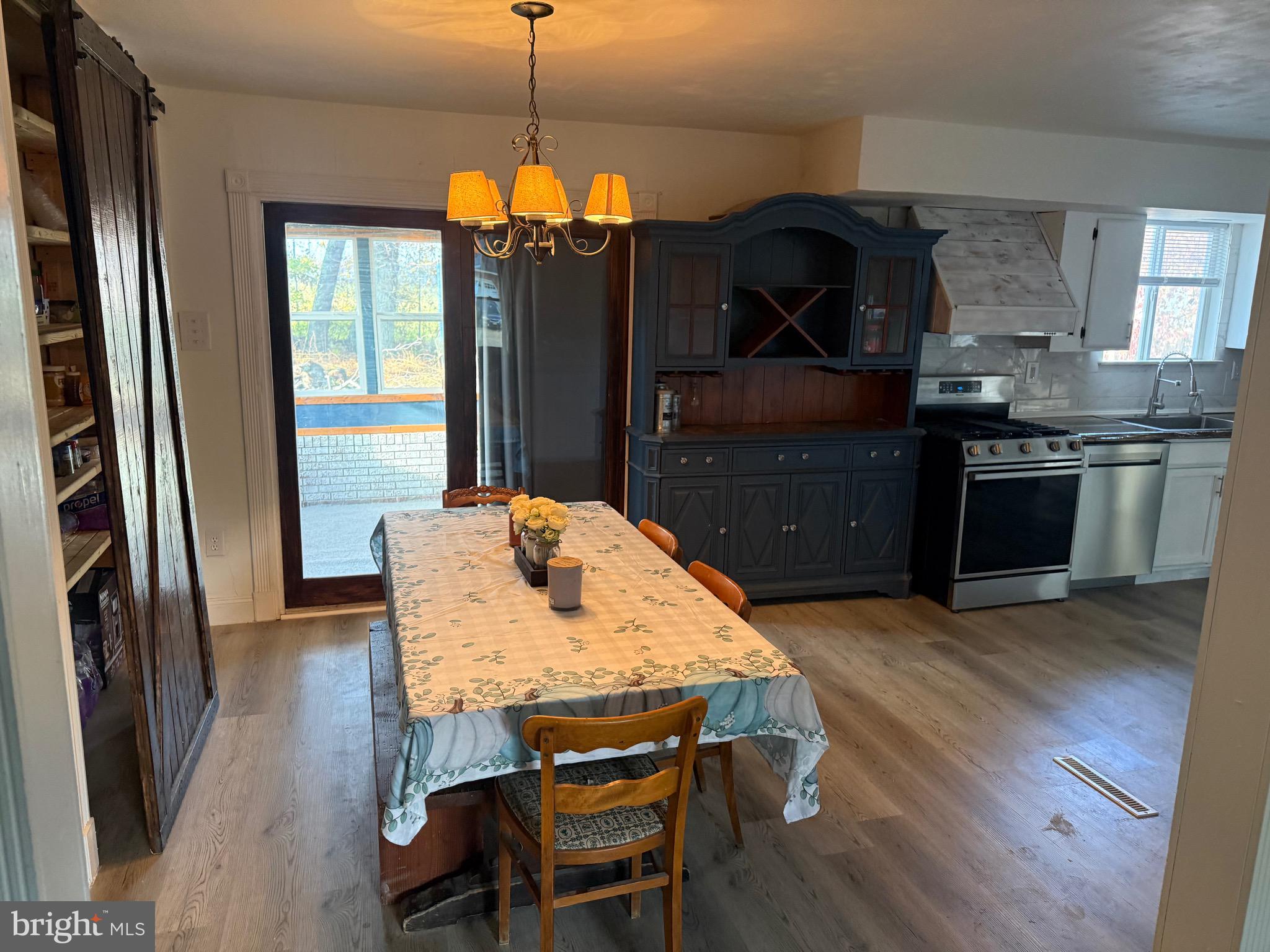40 Woodlane Drive Blackwood, NJ 08012 - Photo 11 of 30 a kitchen with stainless steel appliances granite countertop a stove and refrigerator
