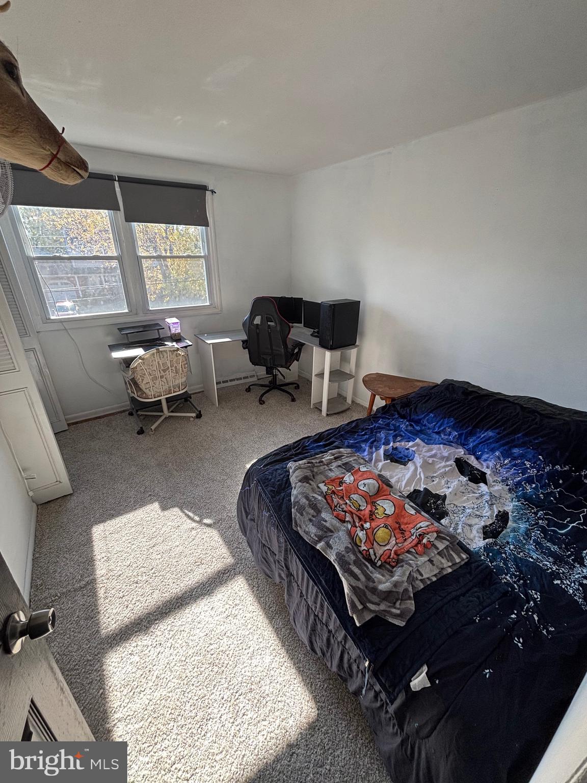 40 Woodlane Drive Blackwood, NJ 08012 - Photo 28 of 30 a bed sitting in a bedroom next to a window