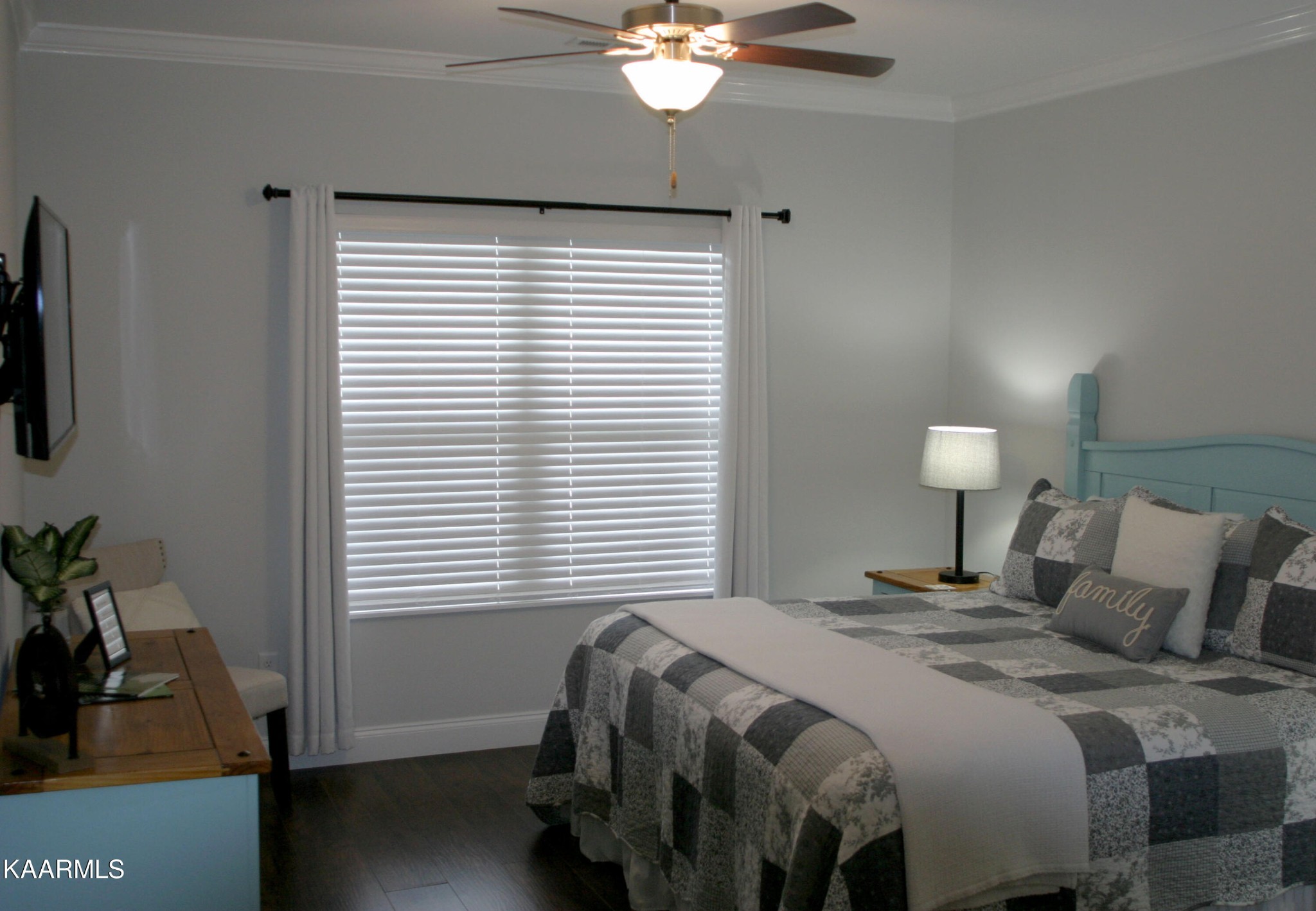 326 Shooting Star Loop, Unit 102 Townsend, TN 37882 - Photo 11 of 22 a bedroom with a bed and a chandelier