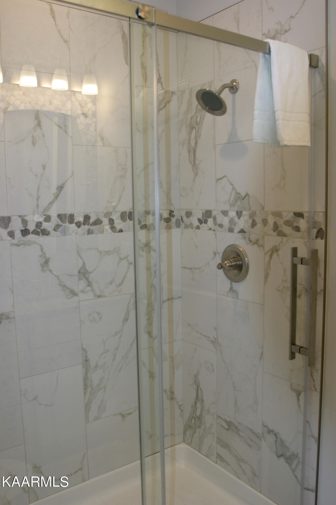 326 Shooting Star Loop, Unit 102 Townsend, TN 37882 - Photo 14 of 22 a bathroom with a shower