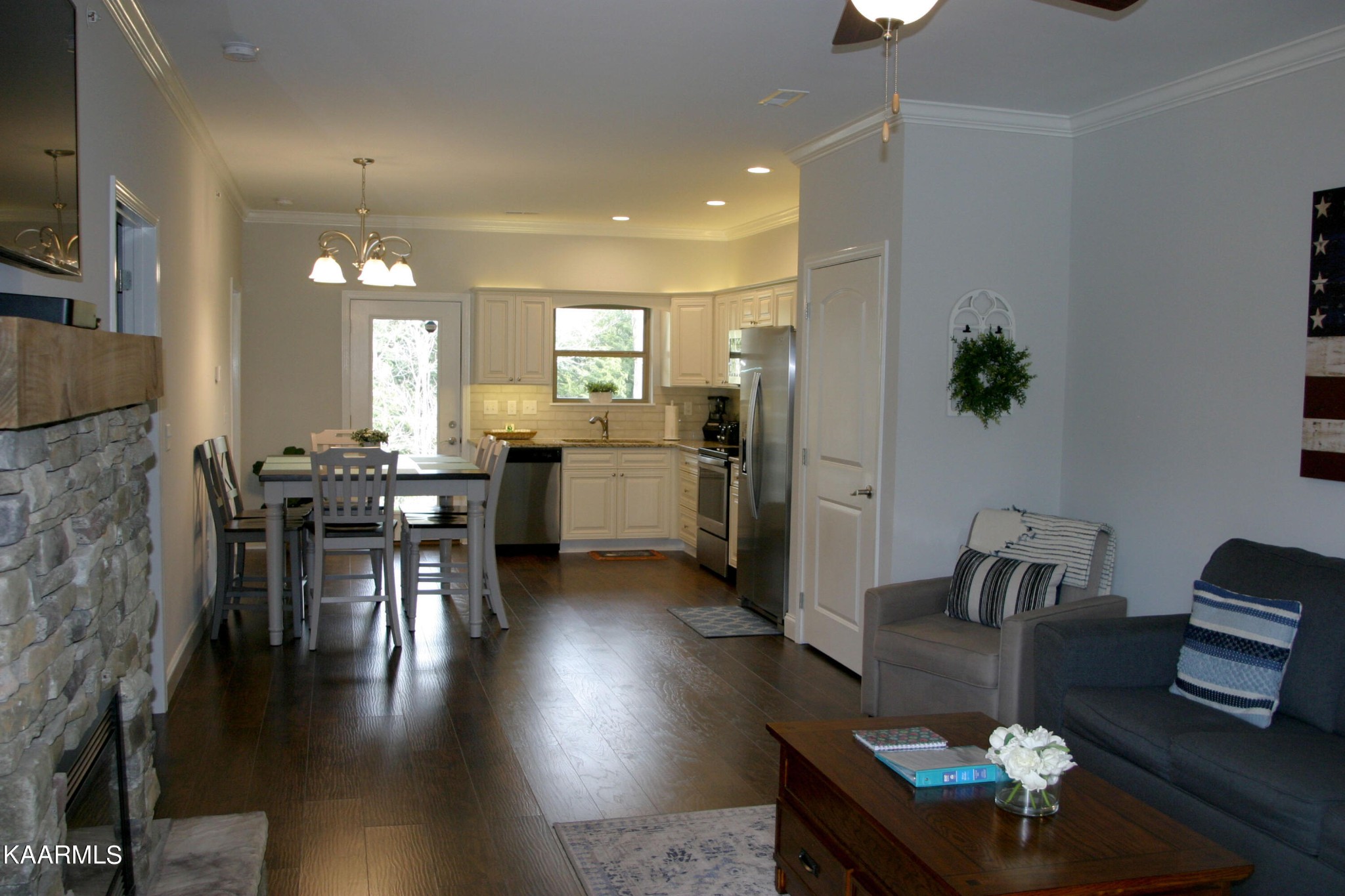 326 Shooting Star Loop, Unit 102 Townsend, TN 37882 - Photo 5 of 22 a view of a dining room with furniture and wooden floor