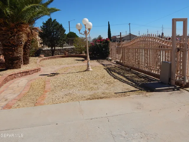 a bathroom with a sink a toilet and a window