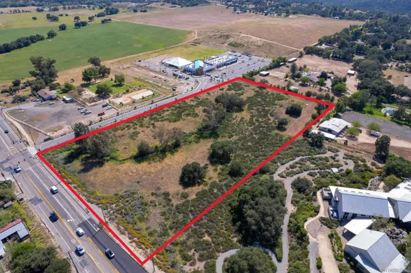 an outdoor space with wooden floor