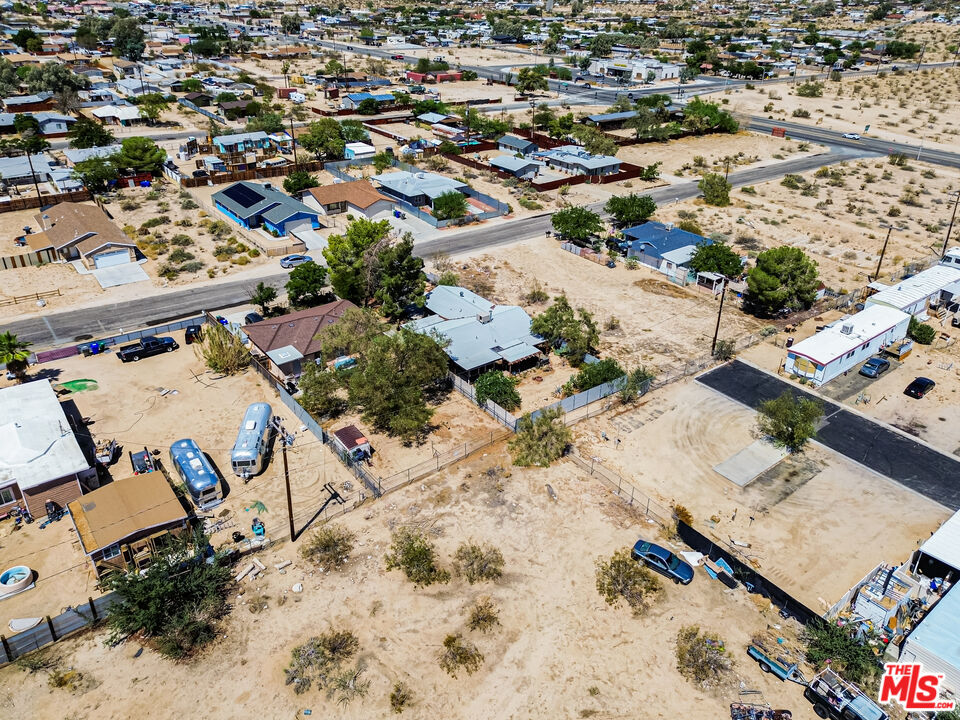 62033 Bonair Road Joshua Tree, CA 92252 - Photo 47 of 53 an aerial view of residential houses with outdoor space