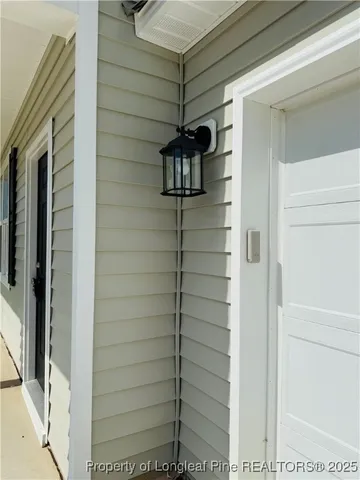 a bathroom with a shower and a sink