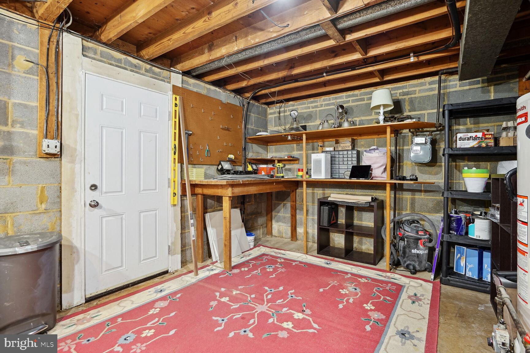 9540 Old Creek Drive Fairfax, VA 22032 - Photo 22 of 36 Storage area with door to exterior, backyard