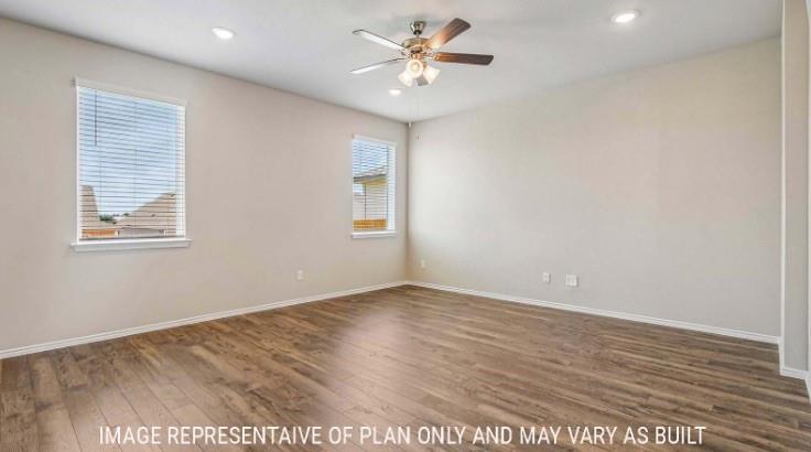 10101 Altair Drive Waco, TX 76708 - Photo 14 of 36 Wood-finish flooring, two windows with blinds, ceiling fan, and recessed lighting
