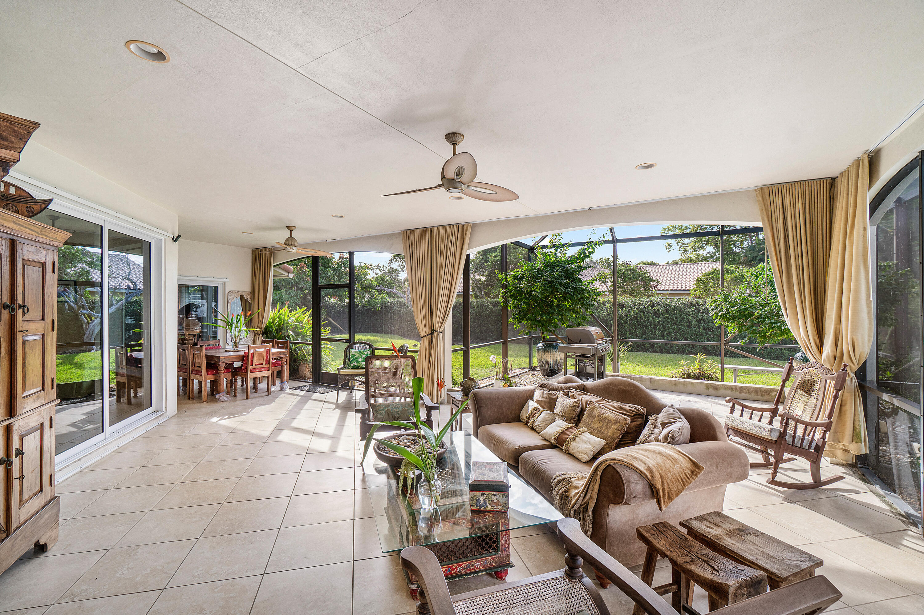 3509 Northwest 26th Court Boca Raton, FL 33434 - Photo 23 of 33 a living room with furniture and a large window