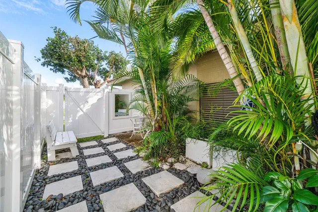 a garden view with a seating space