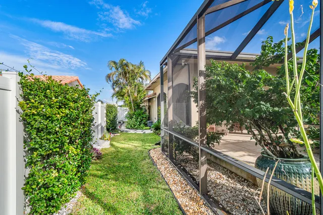 a backyard of a house with lots of green space