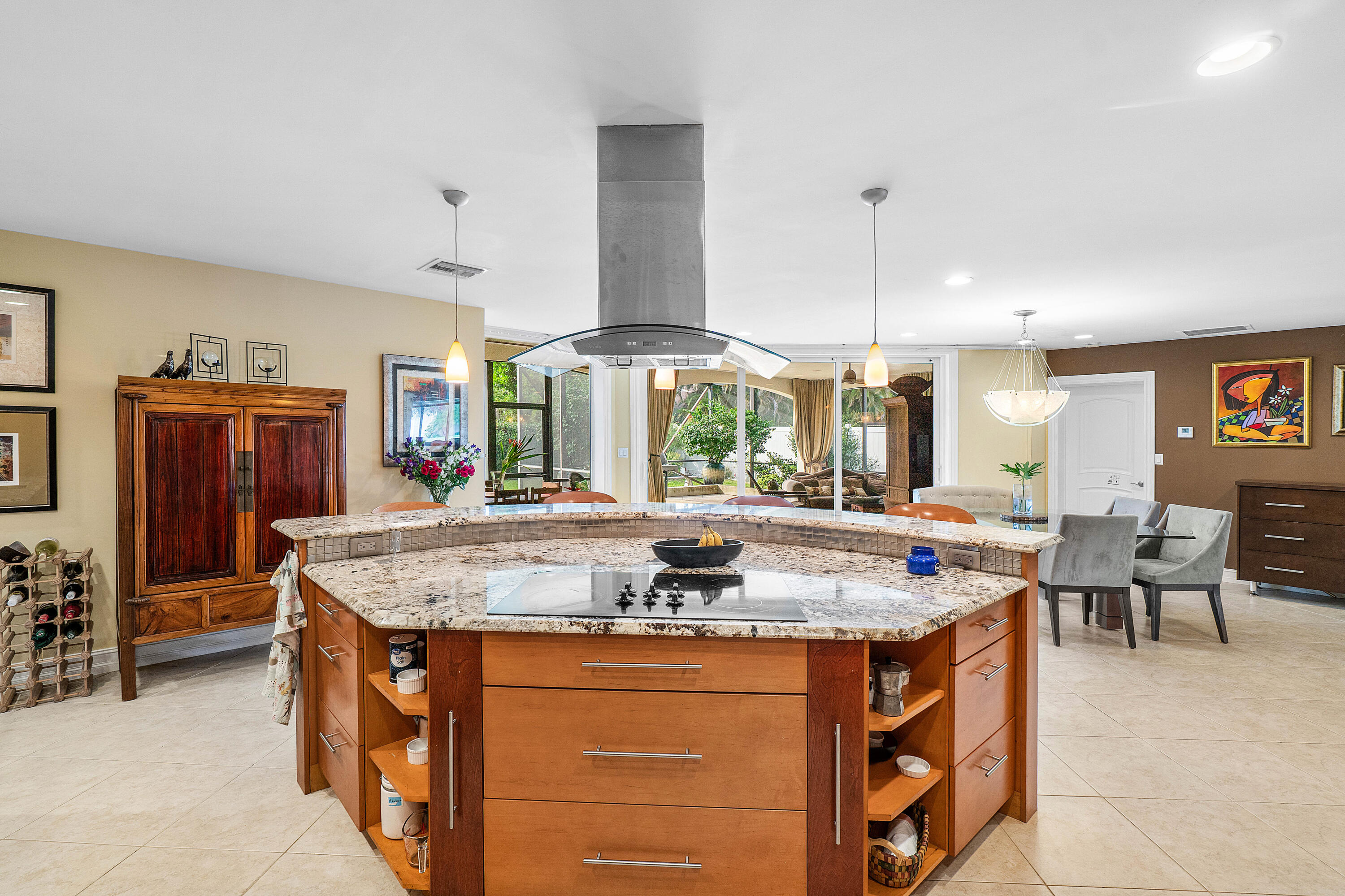 3509 Northwest 26th Court Boca Raton, FL 33434 - Photo 10 of 33 a kitchen with stainless steel appliances granite countertop a stove and a refrigerator